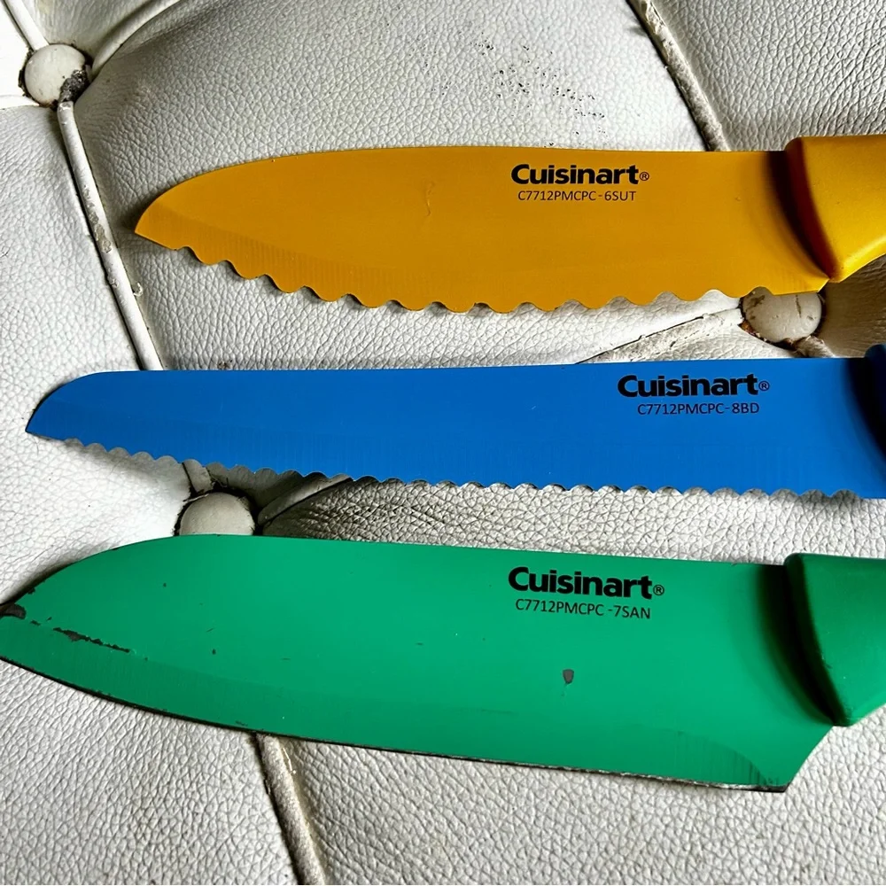 Cuisinart set of 3 knives with sleeves good condition